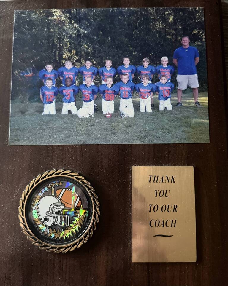 Jeremiah Coaching Youth Football